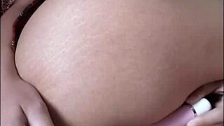 Young girl masturbates passionately in close up view