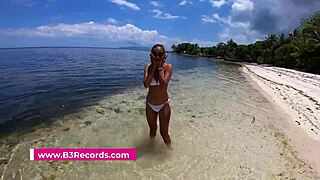 Brunette Girlfriend Sucks Friend's Cock Outdoors On Beach.