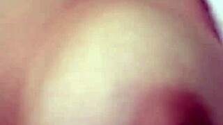 Her big tits bounce as they fuck her ass hard