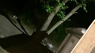 is she sucking his cock on the porch at night?