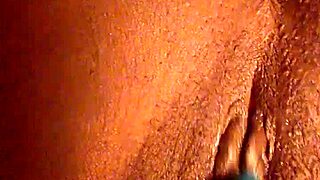 me fingering my pretty ebony pussy up close.