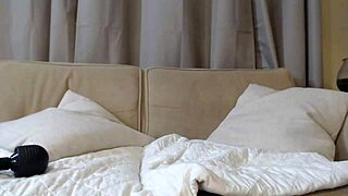 A milf indulges in glass anal masturbation for solo pleasure.