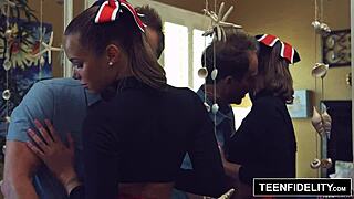 Liza Rowe shakes her pom poms cutely.