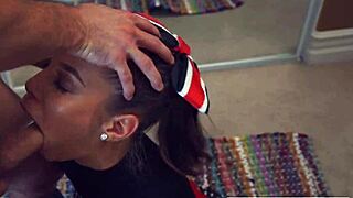 Liza Rowe shakes her pom poms cutely.