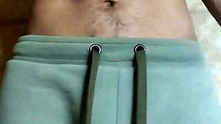 Gay guy toys with his belly button before cumming in solo play.