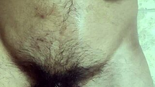 Gay guy toys with his belly button before cumming in solo play.