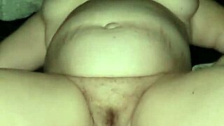 A mature woman experiences a strong orgasm