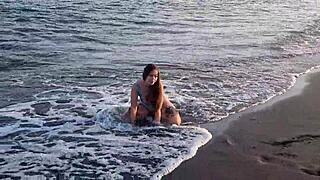 the horny teen anaduro12 shows her big ass pussy on the public beach