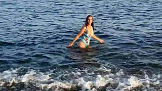 the horny teen anaduro12 shows her big ass pussy on the public beach