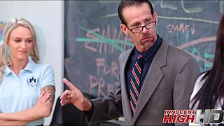 two petite girls take turns blowing teacher in classroom