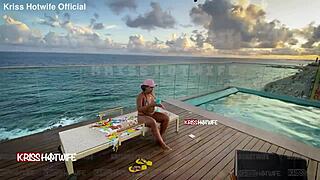 Dancing in micro bikini at hotel pool