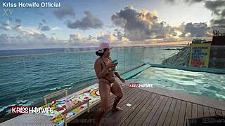 Dancing in micro bikini at hotel pool