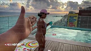 Dancing in micro bikini at hotel pool