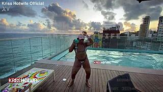 Dancing in micro bikini at hotel pool