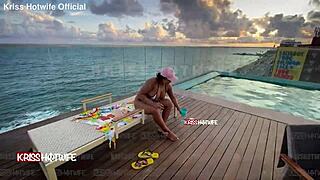 Dancing in micro bikini at hotel pool