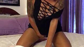 Blonde milf seduces camera with glass dildo