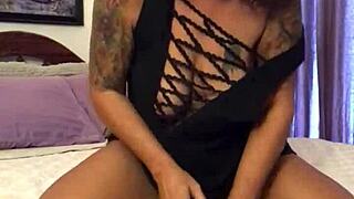 Blonde milf seduces camera with glass dildo