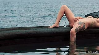 Free spirit girl cat asstrophe enjoys outdoor activities by the shore