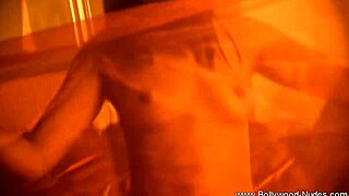 this cute indian babe dances erotically, ripping clothes and undressing nude in a striptease