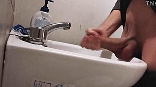 Resting Balls On Sink Before Huge Cumshot