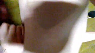 A redhead amateur performs a blowjob on a big cock