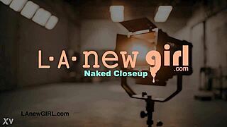 Stunning brunette model reveals her sexy figure on sofa