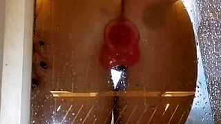 Girl with appetizing ass enjoys shower fun with pink dick