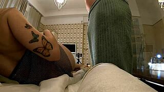 Hot brunette babe teases guy under towel in see through dress