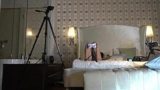 Hot brunette babe teases guy under towel in see through dress