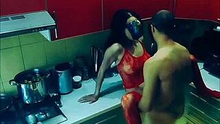 beautiful slender wife in bodysuit passionately connects in the kitchen in all positions
