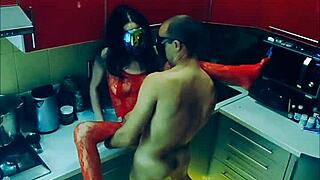 beautiful slender wife in bodysuit passionately connects in the kitchen in all positions