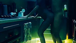 beautiful slender wife in bodysuit passionately connects in the kitchen in all positions