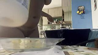 Curvy amateur woman drinks coffee naked, showing big breasts and chatting with camera