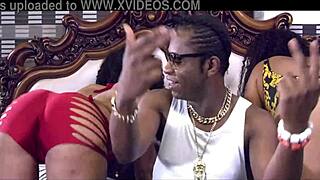 In the African city of Eko, a group of black participants engage in a threesome, focusing on big asses and tongue play