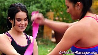 Outdoor masseuse engages in lesbian pussy licking with tattooed dyke