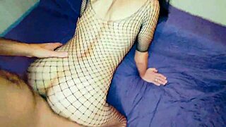 in the bedroom she explores daring experiments with lingerie and stockings