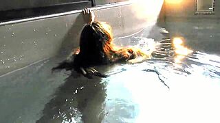 Milf masturbates to orgasm by the pool