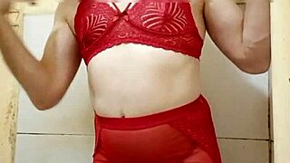 Amateur trans in lingerie lifts miniskirt to show her small cock.