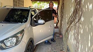 Latina rides stranger's cock in the car for a quick fuck