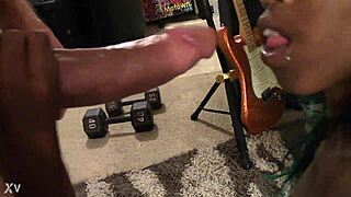 Casual blowjob with black toys in everyday setting