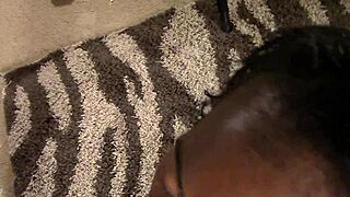 Casual blowjob with black toys in everyday setting