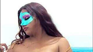 Brunette student teases by touching her big breasts before the exam.