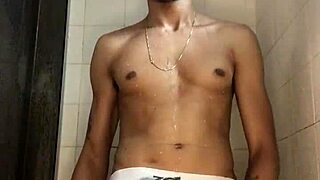 Feeling the thrill as the young guy with big dick jerks off in the shower