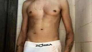 Feeling the thrill as the young guy with big dick jerks off in the shower