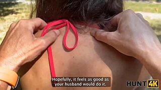 Hunter convinces young lady to chat outdoors.