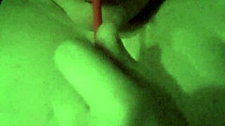 Sucking a lollipop while playing with my wet tits in solo action