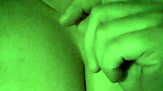 Sucking a lollipop while playing with my wet tits in solo action