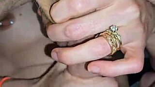 Glove wearing milf milks cock