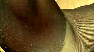 Footjob In Black Stockings For Hubby