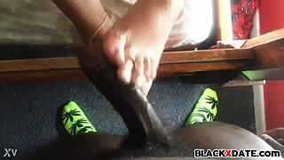 excellent black babe gives homemade footjob